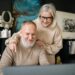 senior couple workin a home desk
