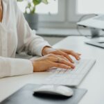 female senior working on laptop