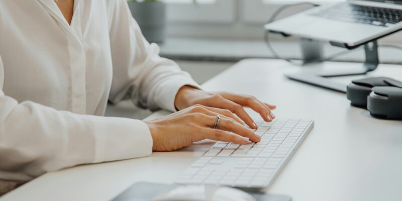 female senior working on laptop