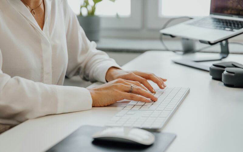 female senior working on laptop