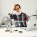 GREY BEARDED SENIOR WORKING ON LAPTOP