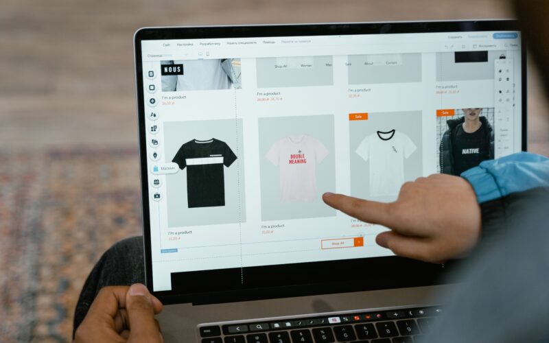 Senior using AI to create print-on-demand designs at home.